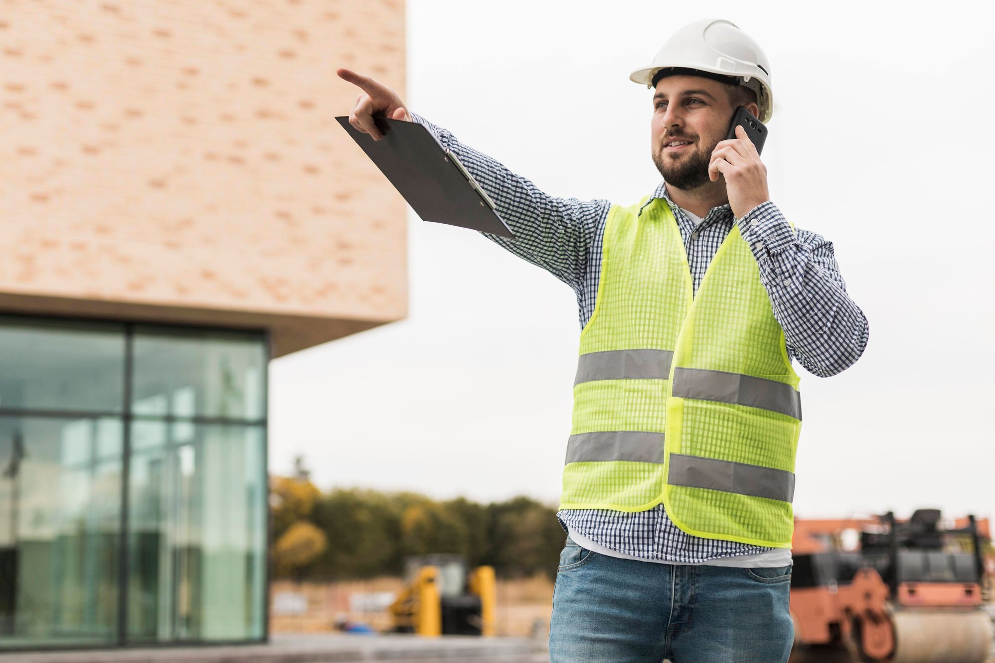 medium-shot-smiley-man-talking-phone